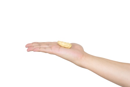 Peanut in hand on white backgroundの写真素材