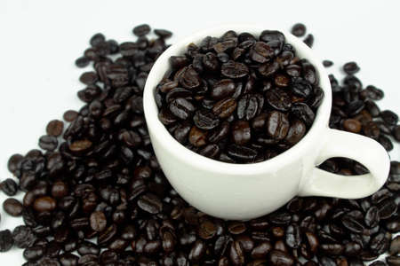 Coffee cup with coffee beansの写真素材