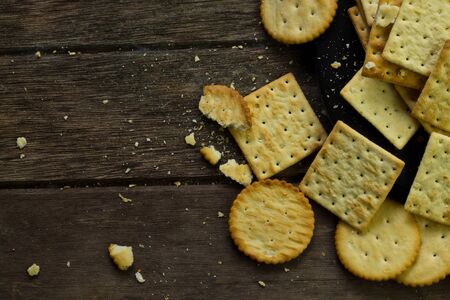Biscuits  on brown wooden backgroundの写真素材