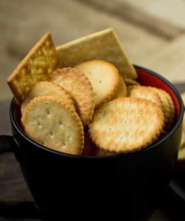 Biscuits  on brown wooden backgroundの写真素材