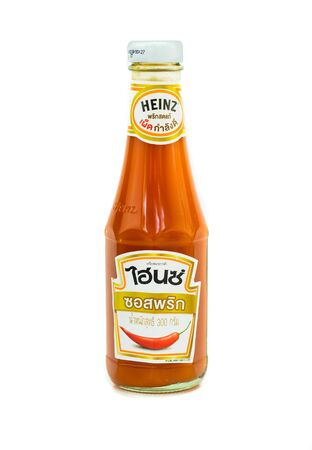 SURATTHANI, THAILAND APRIL 26, 2016.Glass Bottle of Heinz chilli sauce isolated on a white background.  Heinz chilli sauce is a popular product in Thailandのeditorial素材