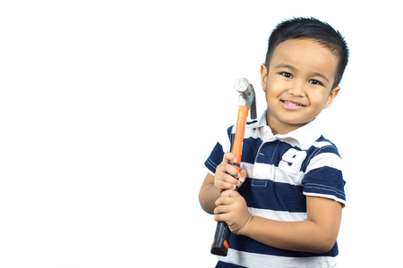 asian boy  holding hammer and smiling on white backgroundの写真素材