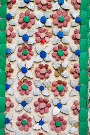 Ornamental ceramic flowers on a pavilion of the Grand Palace,Bangkok の写真素材
