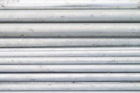 pipe metal cylinder coat galvanized texture backgroundの写真素材