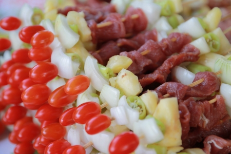 Barbecue with meat and fresh vegetablesの写真素材