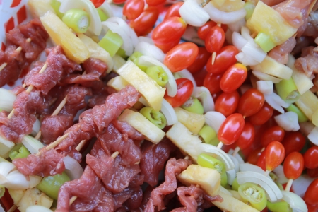 Barbecue with meat and fresh vegetablesの写真素材