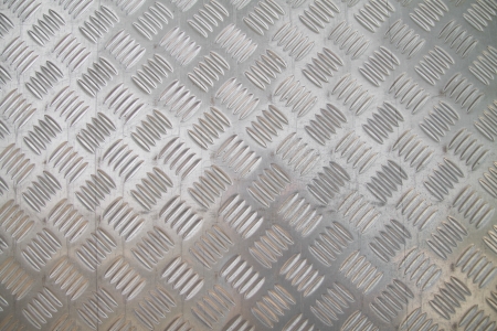 checker plate floor surface texture steel grip metal gratingの写真素材