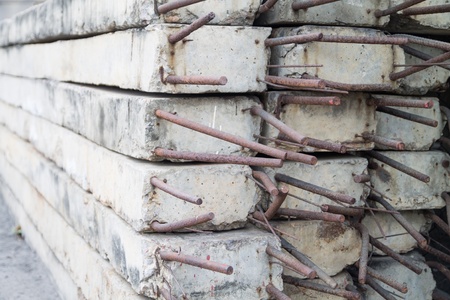 Front and side view of concrete pole pile on groundの写真素材