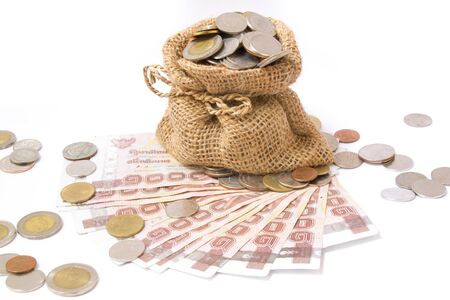 Money coins in bag isolated on whiteの写真素材