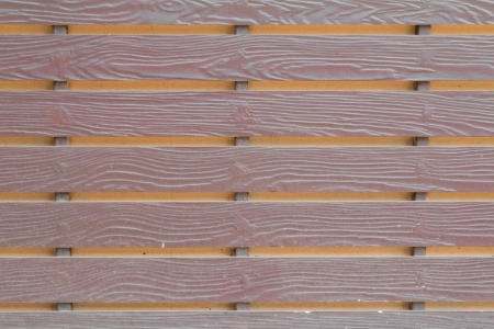 old batten on wall cement orange colorの写真素材