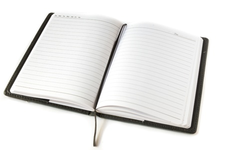 black note book open on a white backgroundの写真素材