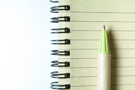Spiral notebook and pen , paper recycleの写真素材