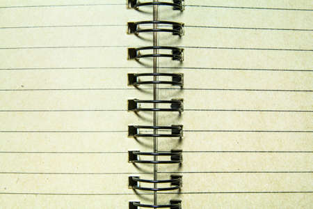 Extreme closeup of a spiral notebookの写真素材