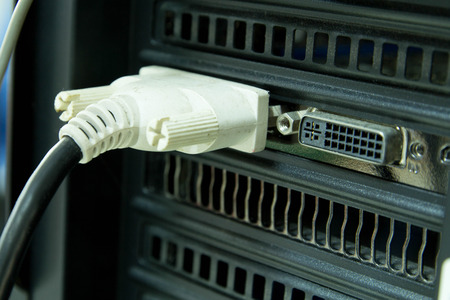 Video DVI cable install on computerの写真素材