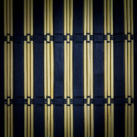 Bamboo mat surface vertical background. Closeup.の写真素材