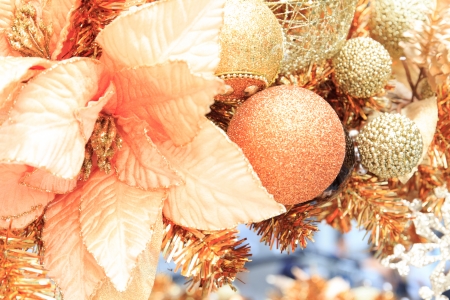 Christmas flower and ball decoration on Christmas tree.の写真素材