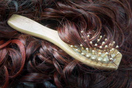 hairbrush with hair background, concept hair loss and healthy Hairの写真素材