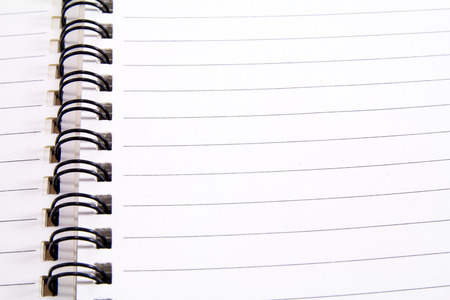 Extreme closeup of a spiral notebookの写真素材