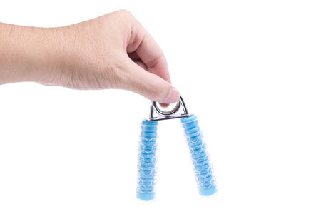 A man squeezing a forearm exercise tool