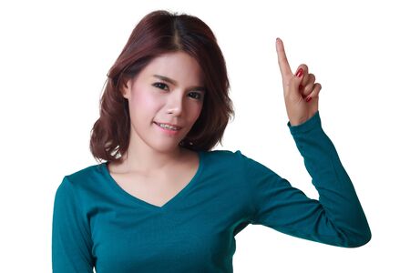 Young excited woman point finger showing something to side empty copy space, concept girl advertisement productの写真素材