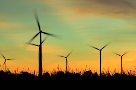 Wind turbine power generator at twilight sunsetの写真素材