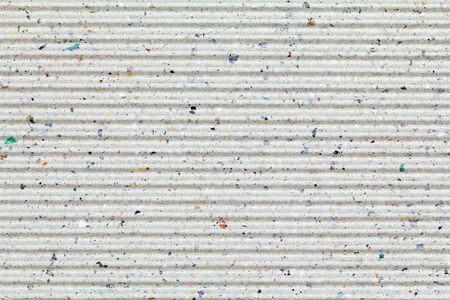brown cardboard texture closeup, natural rough textured paper backgroundの写真素材