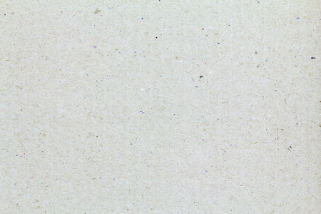 brown cardboard texture closeup, natural rough textured paper backgroundの写真素材