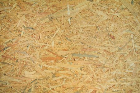 Weathered obsolete rough textured old plywood backgroundの写真素材