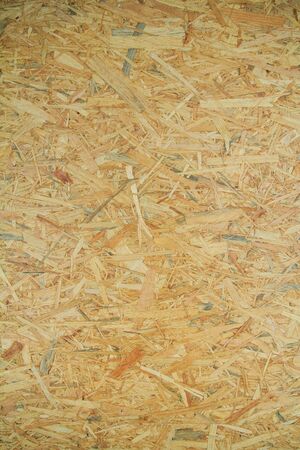Weathered obsolete rough textured old plywood backgroundの写真素材