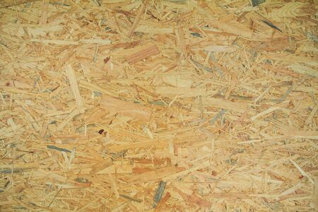 Weathered obsolete rough textured old plywood backgroundの写真素材