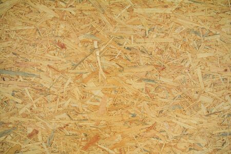 Weathered obsolete rough textured old plywood backgroundの写真素材