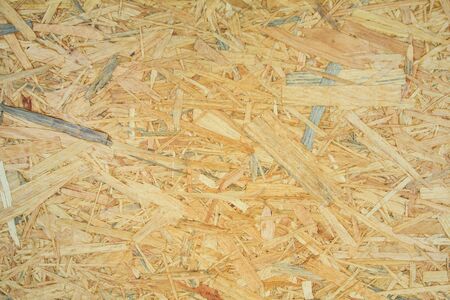 Weathered obsolete rough textured old plywood backgroundの写真素材
