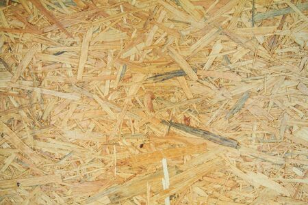 Weathered obsolete rough textured old plywood backgroundの写真素材
