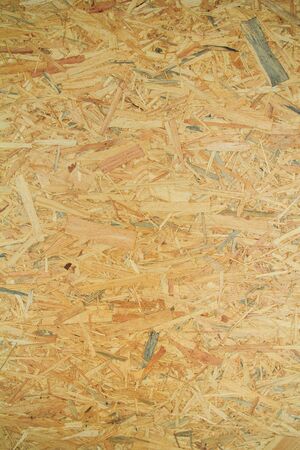 Weathered obsolete rough textured old plywood backgroundの写真素材
