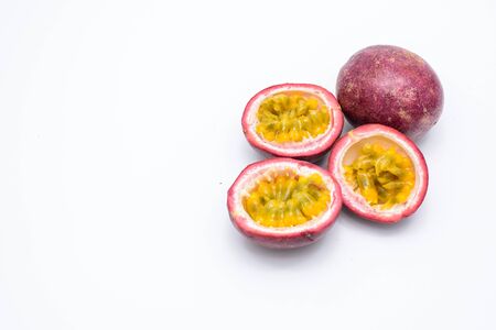 Passion fruit and half isolated on white background.の写真素材