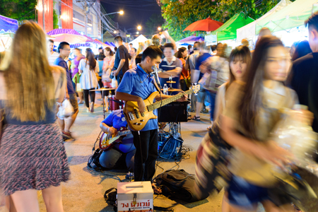 CHIANG MAI THAILAND - AUGUST 21,2016 : Sunday market Chiang Mai walking street, The city center Thai PAN TAO temple marketing and trading of local tourists come to buy as souvenirs in Chiang Mai, Thailand.のeditorial素材