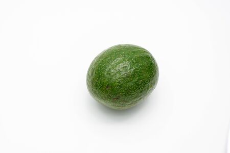 Green avocados isolated on a white backgroundの写真素材