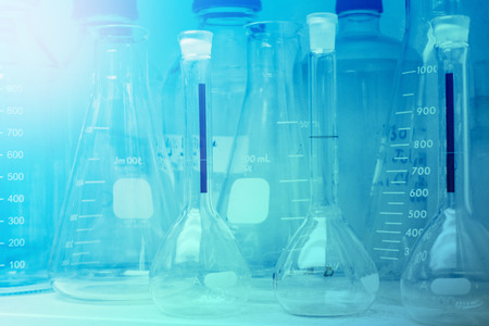 Laboratory Research - Scientific Glassware or beakers For Chemical Background concept.
