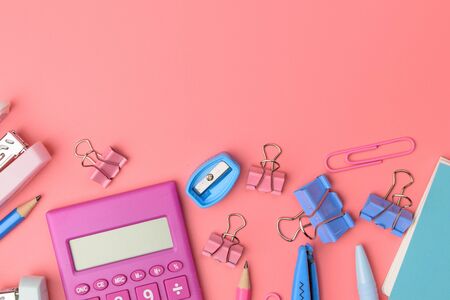 Stationary concept, Flat Lay top view Photo of Scissors, pencils, paper clips,calculator,sticky...
