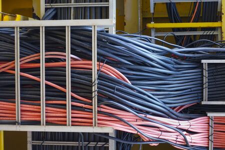 Power cables and instrument cables in the trays with piping construction for duty industry concept.の写真素材