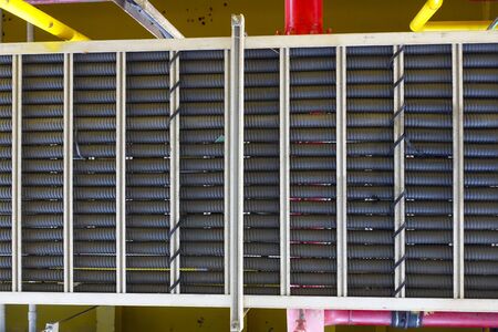 Power cables and instrument cables in the trays with piping construction for duty industry concept.の写真素材