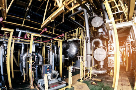 Industry plant concept,Equipment, cables and piping as found inside of a modern industrial power...