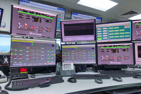 Process control In the System Monitoring Room or control room Work on many monitor. Facility is Full of Screens Showing plant process.の写真素材