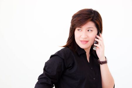 asian woman with telephone on white backgroundの写真素材