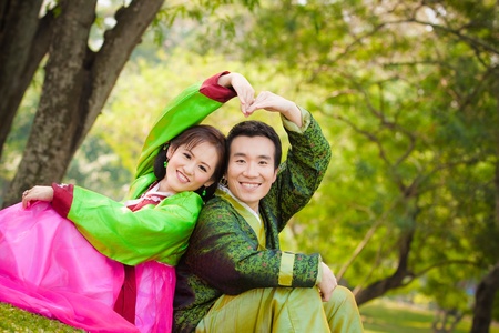 Happy asian couple in korean wedding styleの写真素材