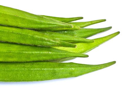 Several okra pods on white backgroundの写真素材