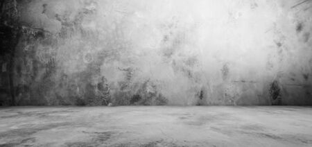 cement floor and wall backgrounds, dark room, interior.の写真素材