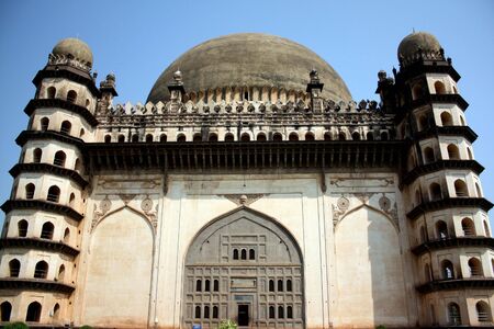 A view of the beautiful architeture of the artistically carved Gol Gumaz (A national heritage site in India), in Bijapur India. の写真素材