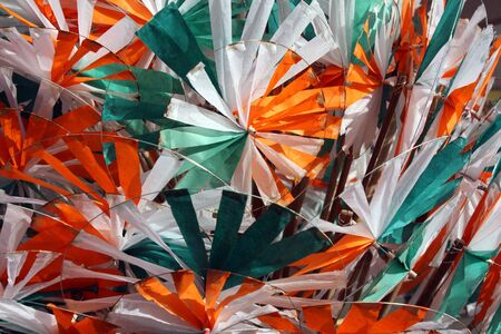 A background of toy windmills with the design of Indian flags.の写真素材