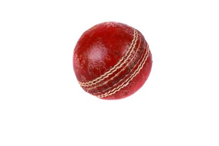 A cricket ball isolated on a white background.の写真素材